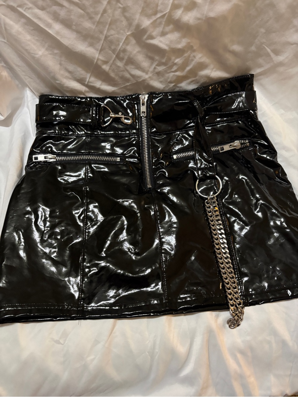 POSTER GIRL Black Patent Mini Skirt with Silver Chain Detail